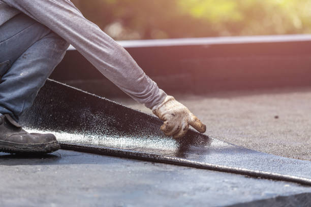 Professional Basement Waterproofing technician working in Green Valley, WI